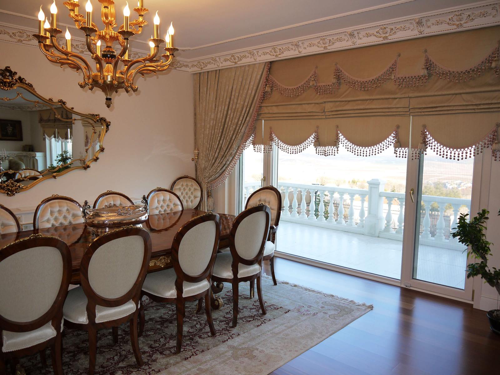 A pale sheer and warm-toned curtain are assessed as one layered composition.